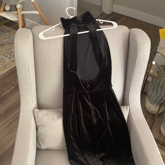 Adorable velvet dress with bow detail on the back and high-neck. - Picture 2 of 2